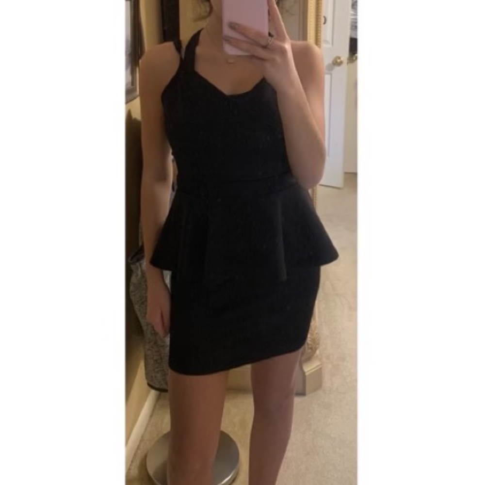 Black mini dress with open back
